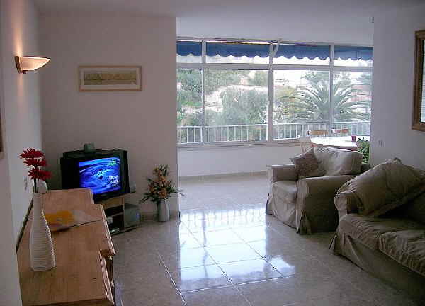 Puerto Portals. The Apartment Lounge looking on to Dinning Terrace